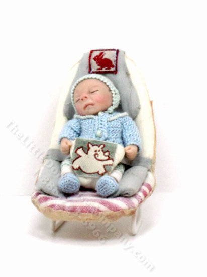 (image for) Sleeping Baby in a Carrier by Catherine Muniere
