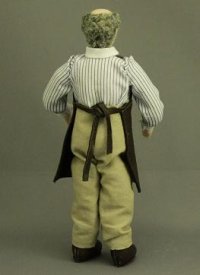 (image for) Man Shopkeeper Doll in Apron by Patsy Thomas
