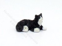 (image for) Dollhouse Scale Model Laying Black and White Cat