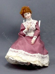 (image for) Vintage Sitting Woman in a Pink Day Dress