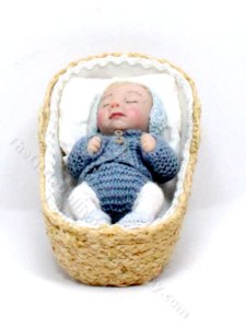 (image for) Sleeping Baby in a Basket by Catherine Muniere