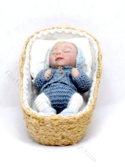 (image for) Sleeping Baby in a Basket by Catherine Muniere