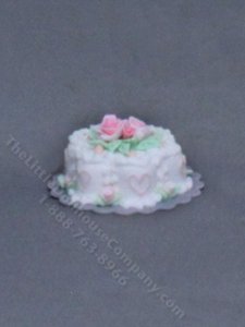 (image for) Dollhouse Scale Model White Flower Cake on a Doily