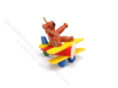 (image for) Miniature Wooden Toy Bear on a Plane