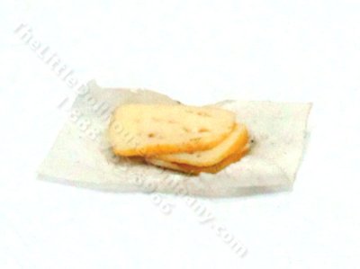 (image for) Miniature Slices of Swiss Cheese on Paper by Charlotte Willmott