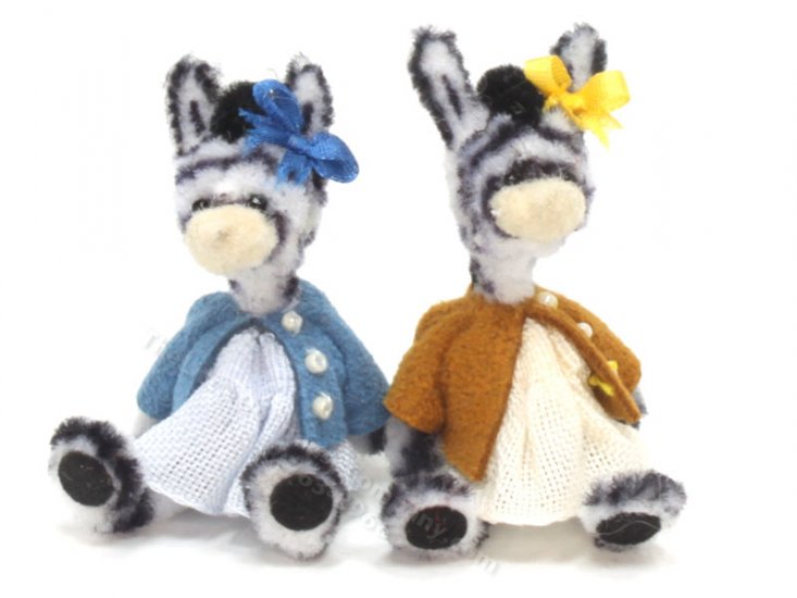 (image for) Miniature Sitting Toy Zebra in Dress by Sue Wilkes.