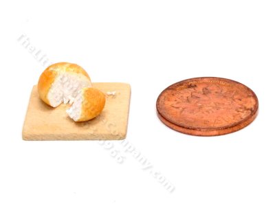 (image for) 1/2 scale Cut Round Bread on Board by Charlotte Willmott