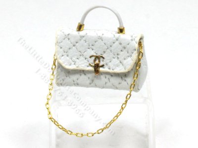 (image for) Miniature Chanel White Quilted Leather Purse by Judith Blondell