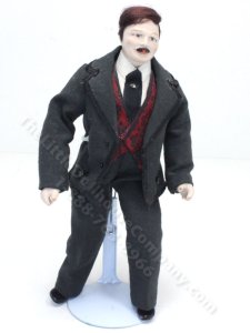 (image for) Middle Aged Moustached Man In Black Suit and Waist Coat
