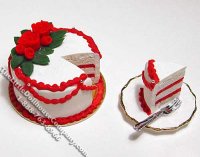 (image for) Dollhouse Scale Model White Christmas Loop Cake w/Slice