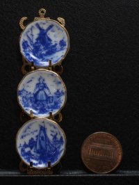 (image for) Miniature Delft Blue Porcelain Plates on Gold Rack