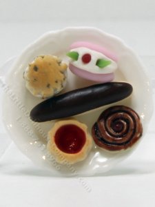 (image for) Miniature Assorted Desserts on Plate by Charlotte Willmott