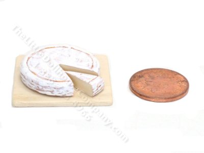 (image for) Miniature Brie Cheese on Cutting Board by Charlotte Willmott