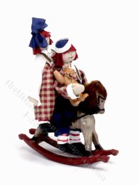 (image for) Miniature Raggedy Ann and Raggedy Andy on Rocking Horse
