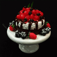 (image for) Miniature Cake with Wild Berry Topping on White Ceramic Pedestal
