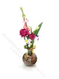 (image for) Miniature Flower Arrangment in an Amber Glass Vase