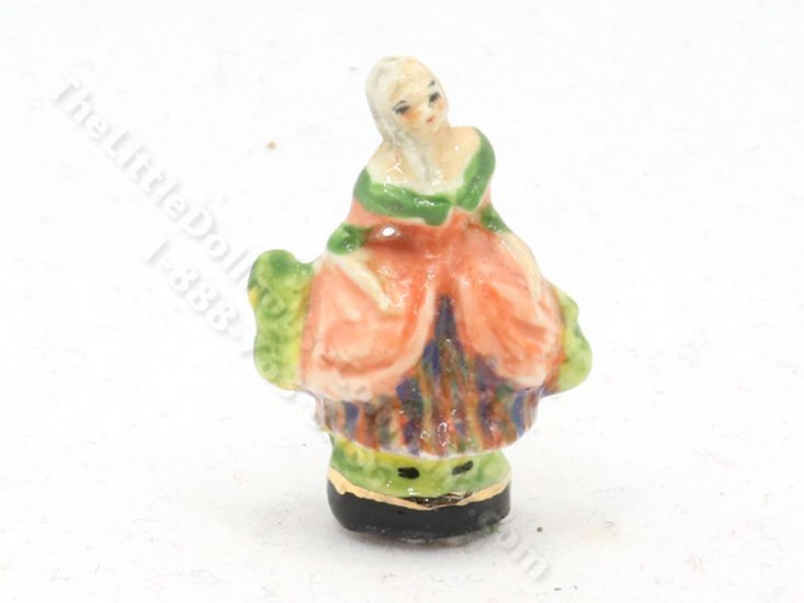 (image for) Miniature Royal Doulton of Lady in a Pink Dress and Bonnet
