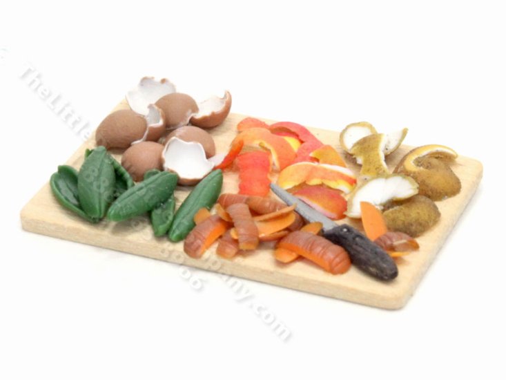 (image for) Miniature Vegetable Peelings on Cutting Board