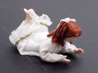 (image for) Red Haired Teen Girl Lying on Tummy