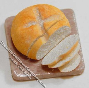 (image for) Dollhouse Scale Model Sliced Soda Bread on Cutting Board