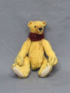 (image for) Miniature Blonde Stuffed Bear in a Scarf by Betty Miniature