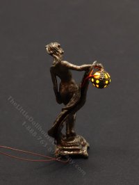 (image for) Miniature Bronze Lady '09 with Amber Light by Jim Pounder