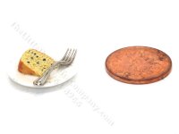 (image for) Miniature Slice of Fruit Cake on a Plate By Charlotte Willmott