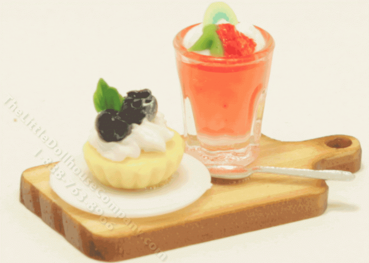 (image for) Miniature Blueberry Tart and Juice on Wooden Board