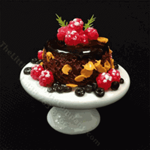 (image for) Miniature Chocolate Cake With Raspberries on Ceramic Pedestal