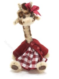 (image for) Miniature Dressed Sitting Toy Giraffe in Dress by Sue Wilkes.