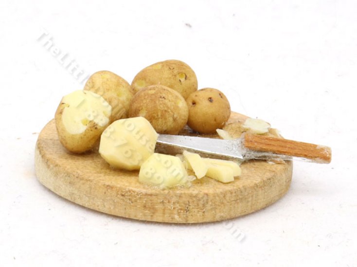 (image for) Miniature Potatoes on a Cutting Board