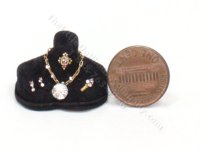 (image for) Miniature 5-Piece Gold and Diamond Jewelry Set on Black Bust