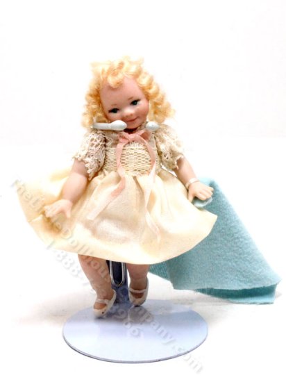 (image for) Miniature Toddler Girl with her Blanket