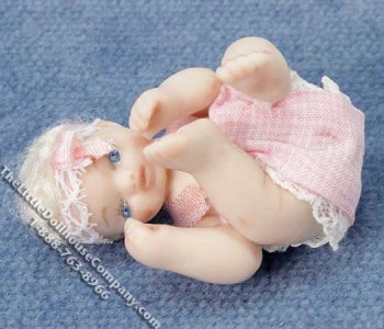 (image for) Infant Doll Trying to Suck Toe for Dollhouses