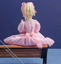 (image for) Girl with Blonde Curly Hair in Pink Striped Dress for Dollhouses