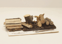 (image for) Miniature Chopping Wood With Small Wood Pile by Amy Robinson