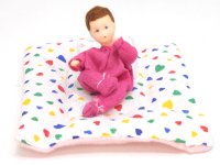 (image for) Brunette Baby Girl Flexible Doll on Blanket by Erna Meyer