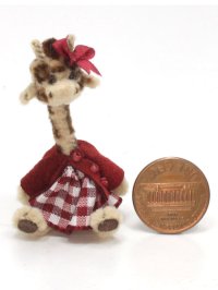 (image for) Miniature Dressed Sitting Toy Giraffe in Dress by Sue Wilkes.