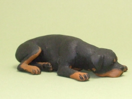 (image for) Miniature Laying Female Rottweiler with Head Down