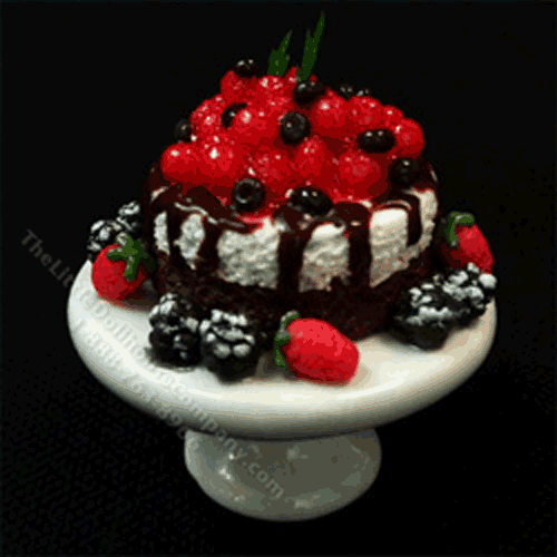 (image for) Miniature Cake with Wild Berry Topping on White Ceramic Pedestal