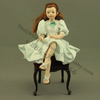 (image for) Sitting Girl in Green Striped Dress by Patsy Thomas